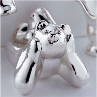 Figurine Ours couch�  par Robbe & Berking