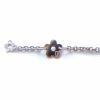 Rajout d'un motif marguerite pour bracelet anniversaire