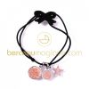 Bracelet �lastique noeud noir et perles roses p�les chance street