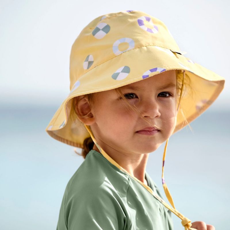 Chapeau réversible anti-UV Bouée jaune pâle (7-12 mois) Lässig Ambiance 2