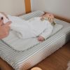 Matelas à langer avec housse Home Praliné Rayures Matcha Walking Mum Ambiance 2