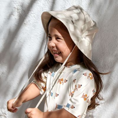 Chapeau anti-UV réversible Motif damier stone et sel marin (1-3 ans)