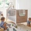 Lit bébé évolutif 70x140 cm avec 2 pans de transformation en chêne Marcel Galipette Ambiance 2