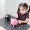 Tirelire cochon noire  par Plan Toys