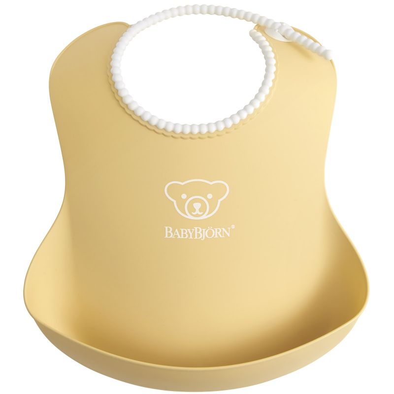 Bavoir plastifié à poche jaune pastel BabyBjörn