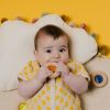 Hochet sensoriel Calm Donut orange Petit Boum Ambiance 2