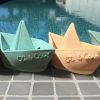 Jouet de bain bateau origami latex d'hévéa vert d'eau  par Oli & Carol