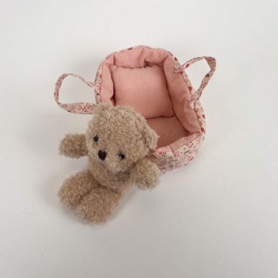 Peluche Mini Morris dans son couffin