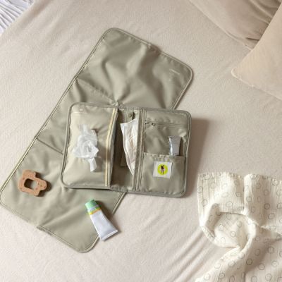 Pochette de change coutures à vagues menthe