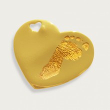 Pendentif empreinte coeur trou coeur avec cordon (or jaune 750°)   par Les Empreintes
