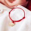 Bracelet cordon Croix ivoire plaqué or 10-14 cm (personnalisable)  par Petits trésors