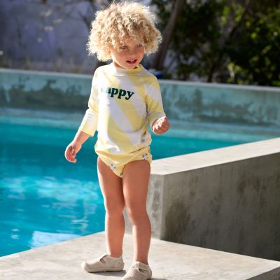 T-shirt anti-UV manches longues Rayures jaune pâle et sel marin (4-5 ans)