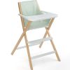 Chaise haute pliable Traveller en bois naturel et blanc avec tablette  par Geuther