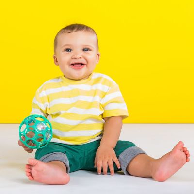 Balle hochet sensoriel vert