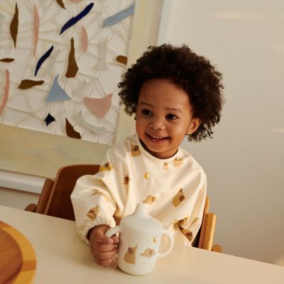 Bavoir à manches Merle Elephant Crème de la crème