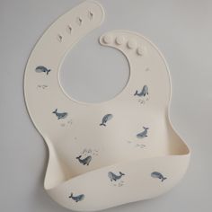 Bavoir à poche en silicone Baleine