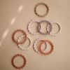 Lot de 3 bracelets de dentition Flower Rose/Blush/Shifting sand  par Mushie
