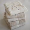 Couverture tricotée en coton bio Pointelle Ivory (100 x 80 cm)  par Mushie