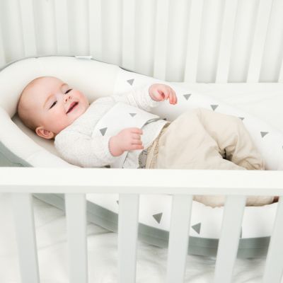 Réducteur de lit et oreiller bébé