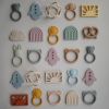 Jouet de dentition Sun Muted yellow  par Mushie