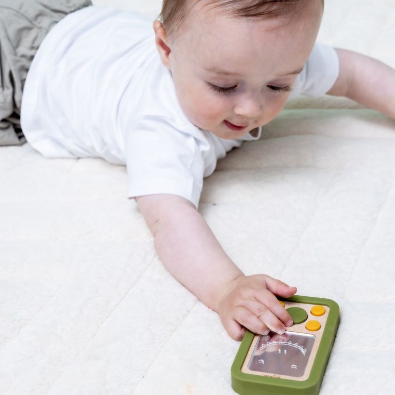 Jouet d'activités téléphone en silicone et bois Mr. Dino Trixie Ambiance 3