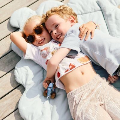 Tapis de jeu Biscuit Dreams bleu ciel (95x75 cm)