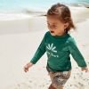 T-shirt anti-UV Palms green (25-36 mois)  par Lässig 