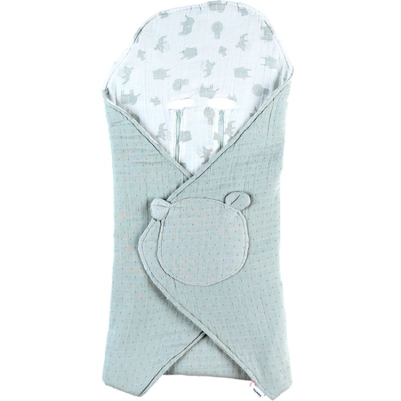 Couverture nomade en mousseline de coton bio Safari sauge Noukie's