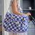 Variation Bleu, écru, orange du produit Sac à langer Comme un bonbon Romy damier bleu de la marque BEBEL