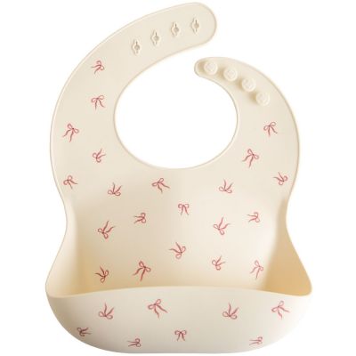 Bavoir à poche en silicone Bows Mushie