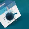 Peluche avec coffret lapin bleu-vert Happy Pop (25 cm)  par Doudou et Compagnie