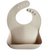 Bavoir à poche en silicone Shifting Sand Mushie Produit 1