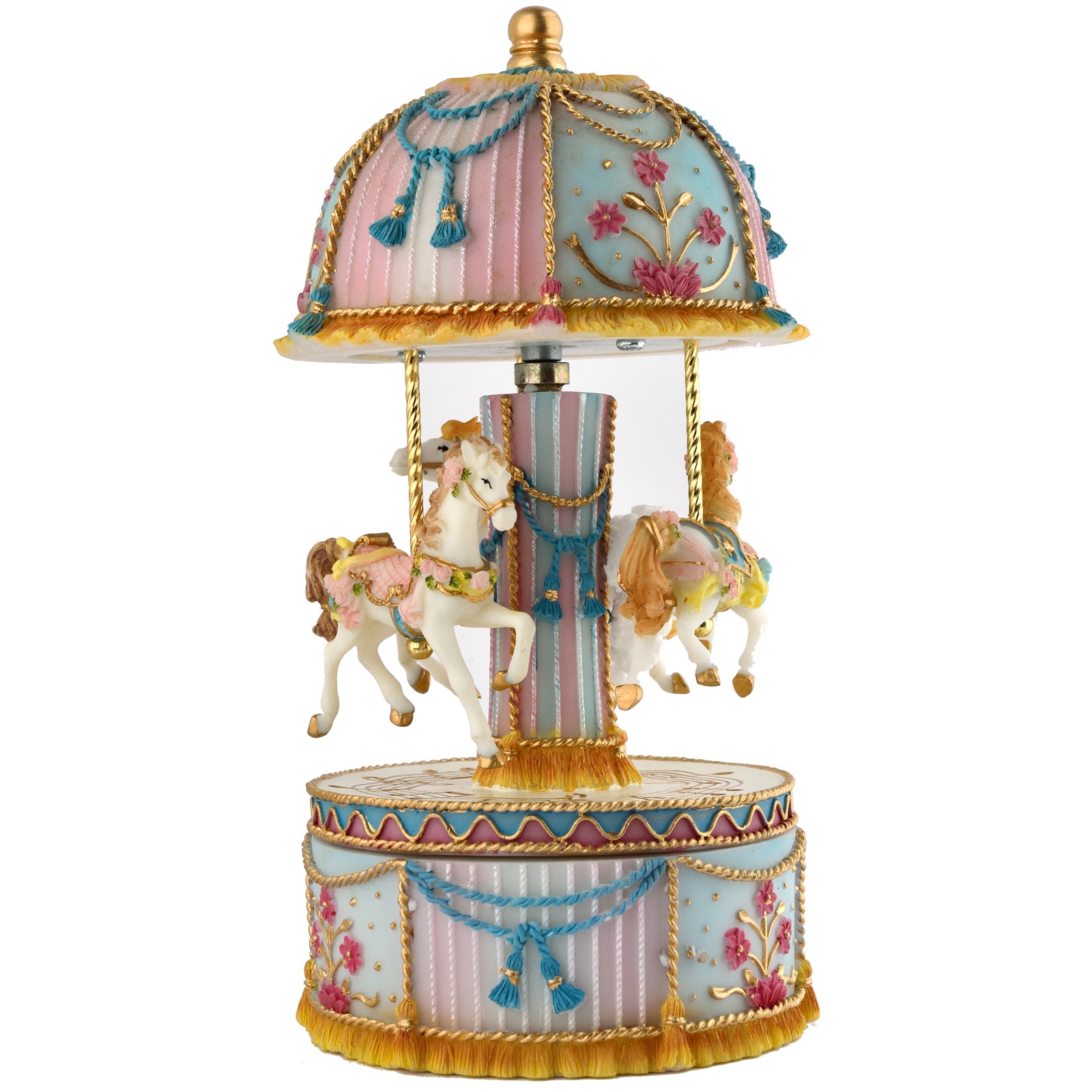 Petite boîte à musique carrousel bleu et rose avec trois chevaux en bois qui tournent à la mode idéale comme jouet ou cadeau de Noël.
