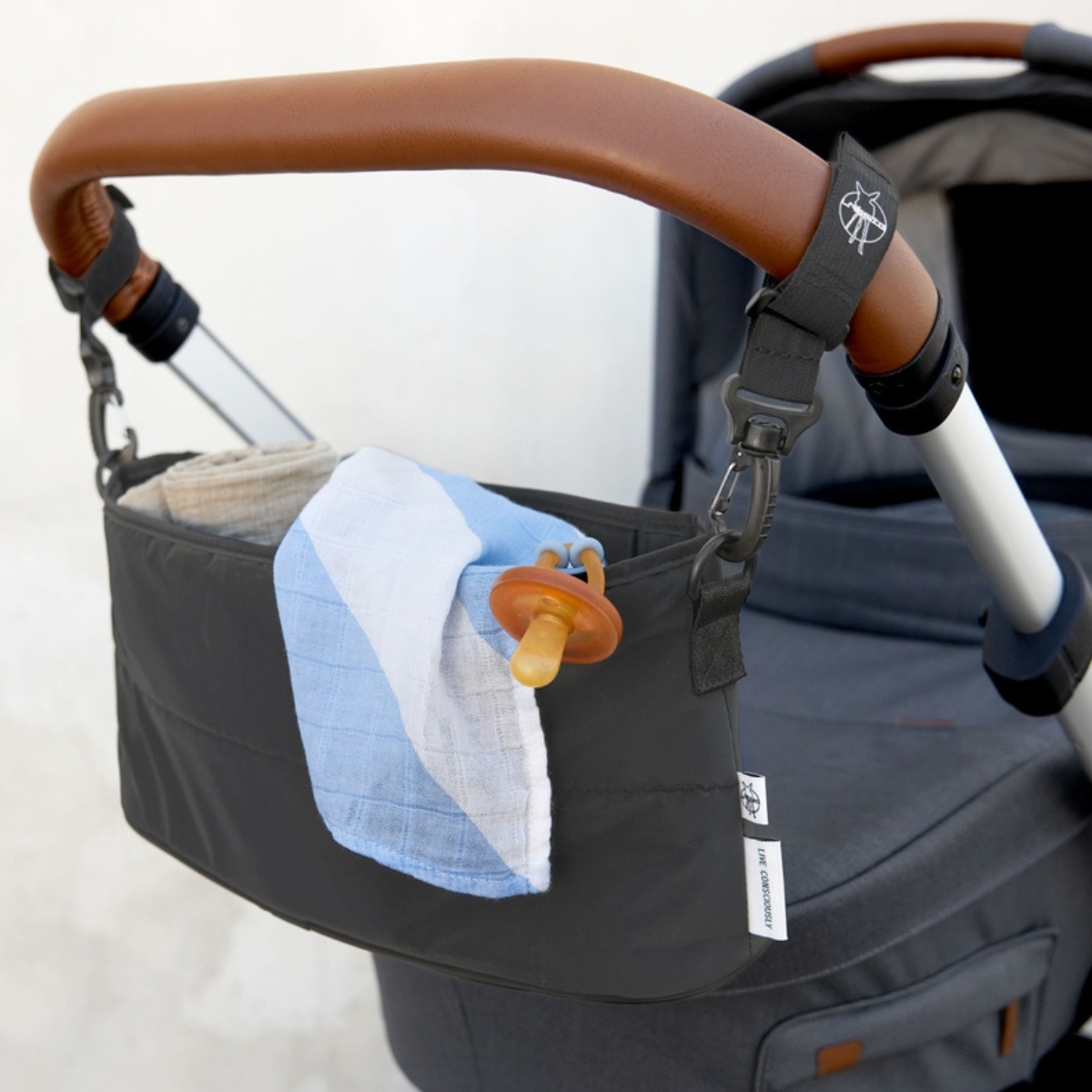 Sac organisateur pour poussette et buggy avec différents compartiments, noir